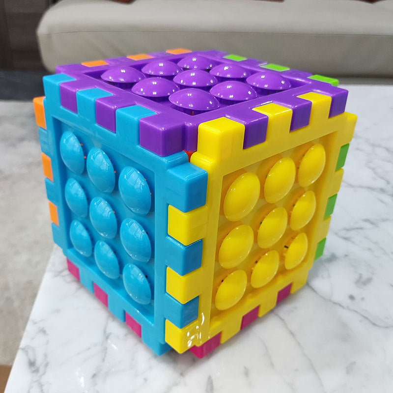 Large interlocking cube blocks, large mushroom-shaped pegs, educational toys for developing hands-on skills, and in various colors.